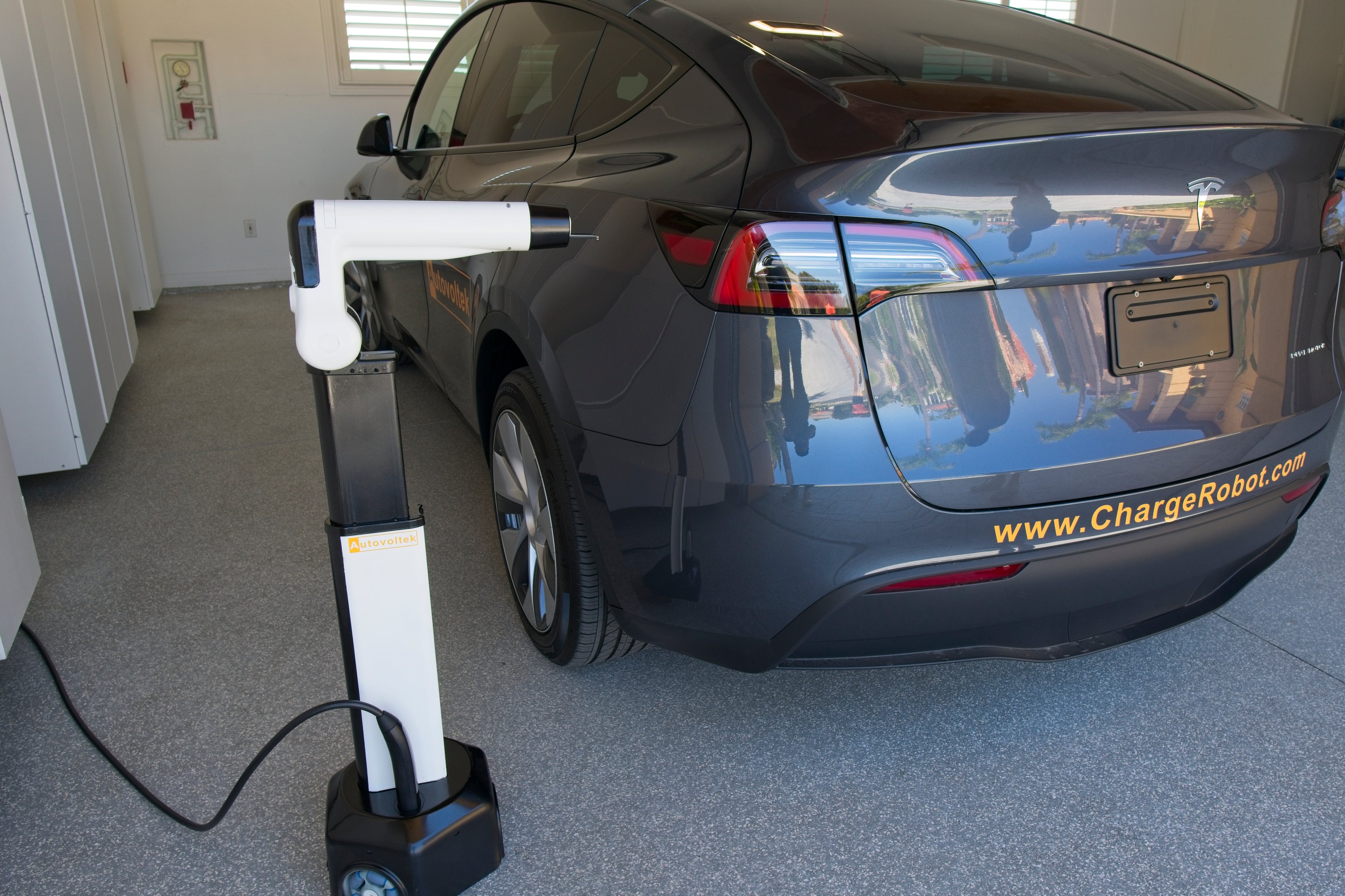 Load video: Video demo of Autovoltek&#39;s ChargeRobot, an automated EV charging robot